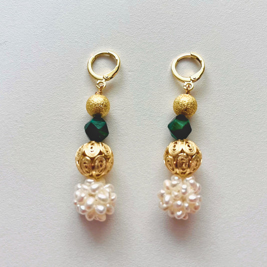 Pearl Cluster Drop Earrings — pair laid flat, showing brushed gold ball, green stone, filigree bead and pearl cluster drop