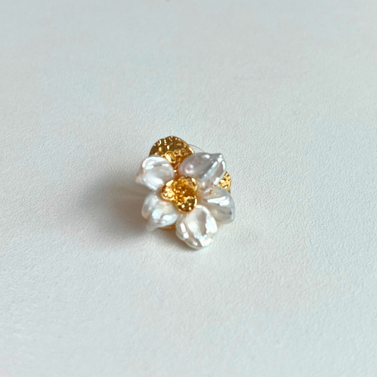 Baroque Pearl Flower Stud Earrings — baroque pearl petals clustered into a flower around a hammered gold centre