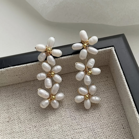 Pearl Flower Drop Earrings — cascade of three hand-strung pearl daisies