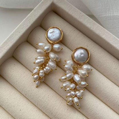 Grappe de Perles Drops — gold wire-wrapped coin pearl with cascading freshwater pearl cluster