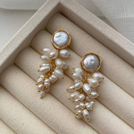 Grappe de Perles Drops — gold wire-wrapped coin pearl with cascading freshwater pearl cluster