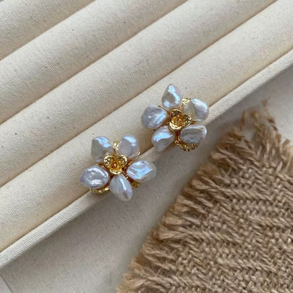 Baroque Pearl Flower Stud Earrings — baroque pearl petals clustered into a flower around a hammered gold centre
